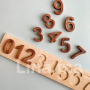 لوحة خشبية بقطع التركيب للأرقام